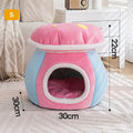 Grey mushroom-shaped plush cat bed on a wooden floor