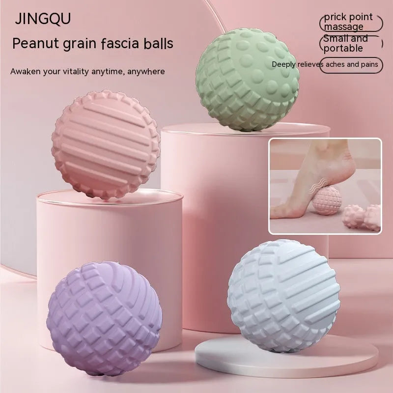A blue TPR foot massage ball, 6cm in diameter, resting on a plain surface.