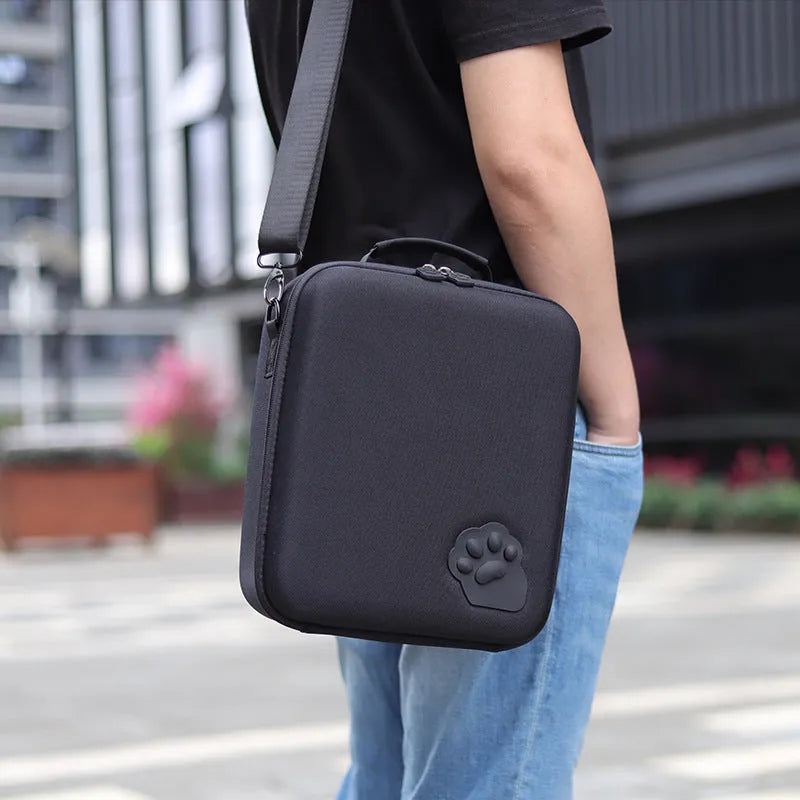 Switch game console storage bag with shoulder strap and game cartridge slots