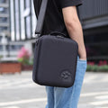 Switch game console storage bag with shoulder strap and game cartridge slots