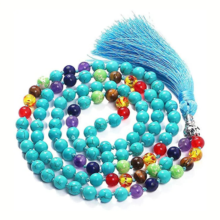 Long beaded agate and amethyst tassel necklace with blue grain stone and lapis lazuli on a geometric design.