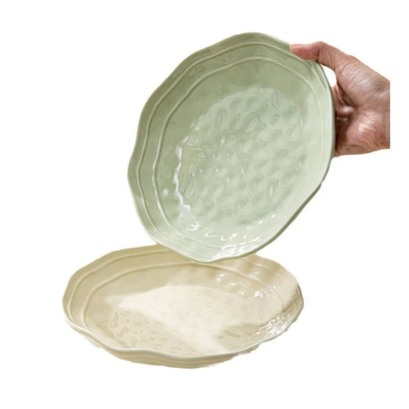 Seven-piece solid colour ceramic tableware set in a gift box, showing minimalist Japanese style plates and bowls.