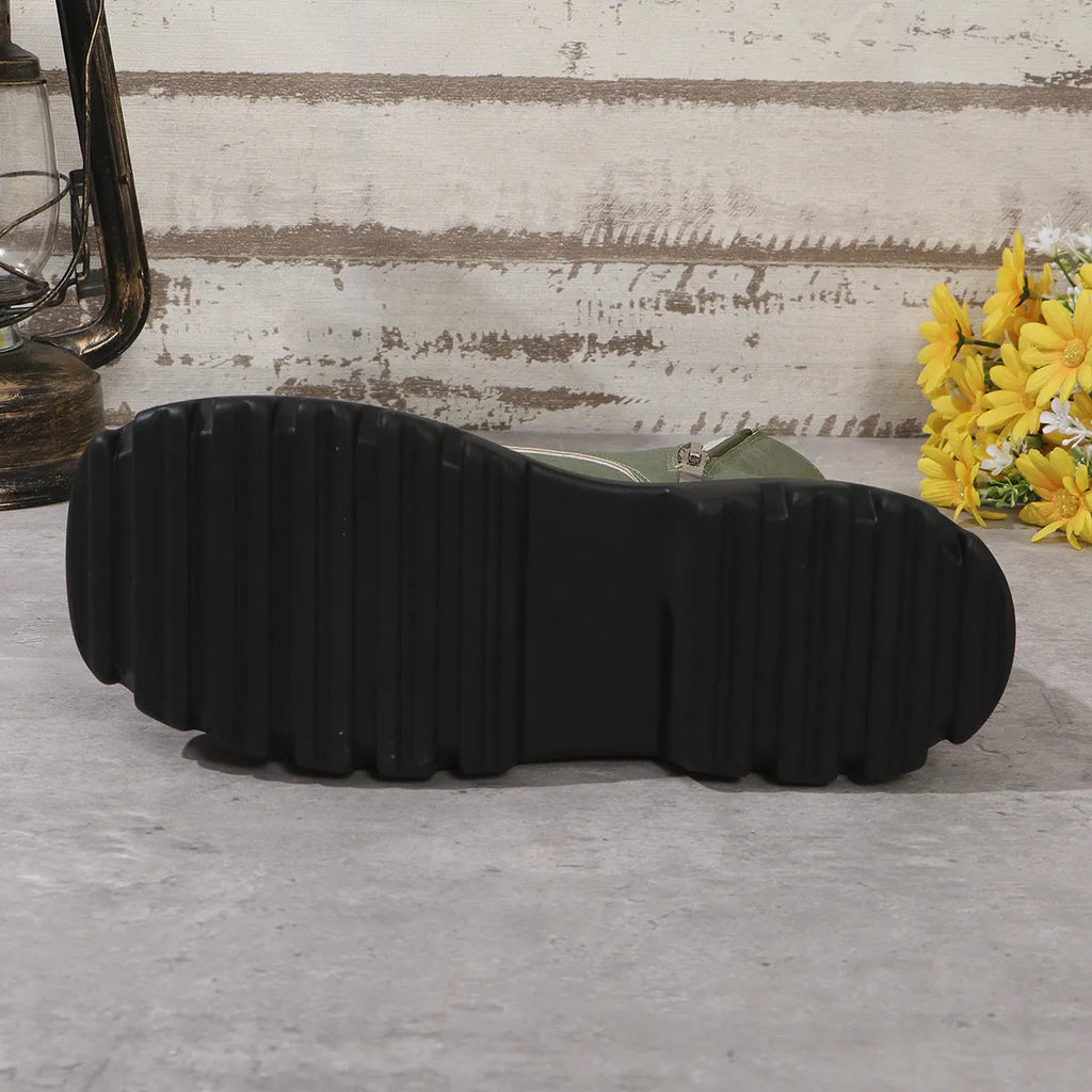 Women's black platform boots with chunky heel and side zipper closure