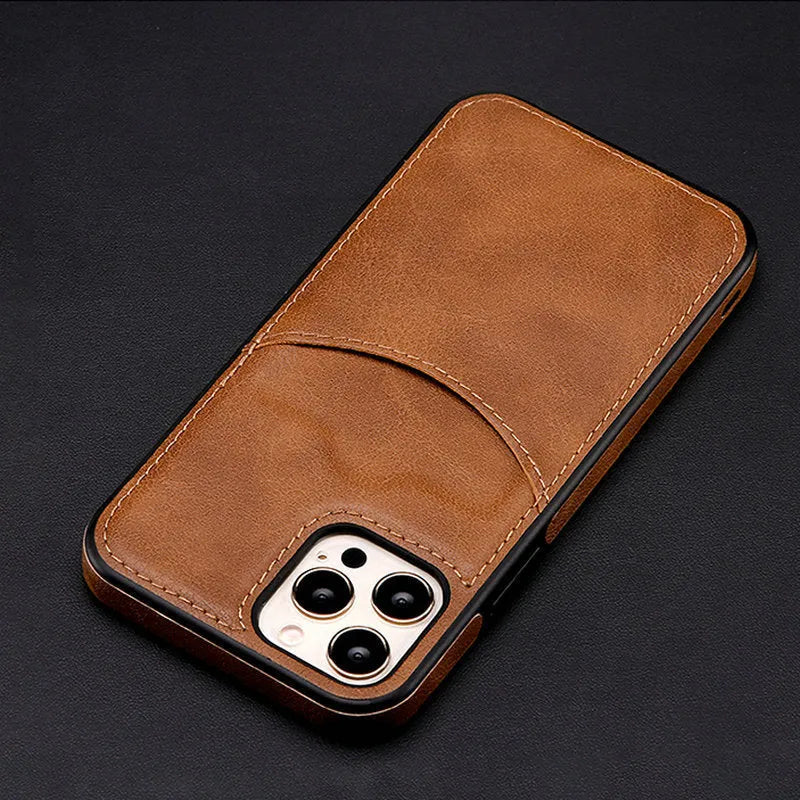 Dark blue PU leather protective case fitted on an iPhone 14 Pro Max smartphone.