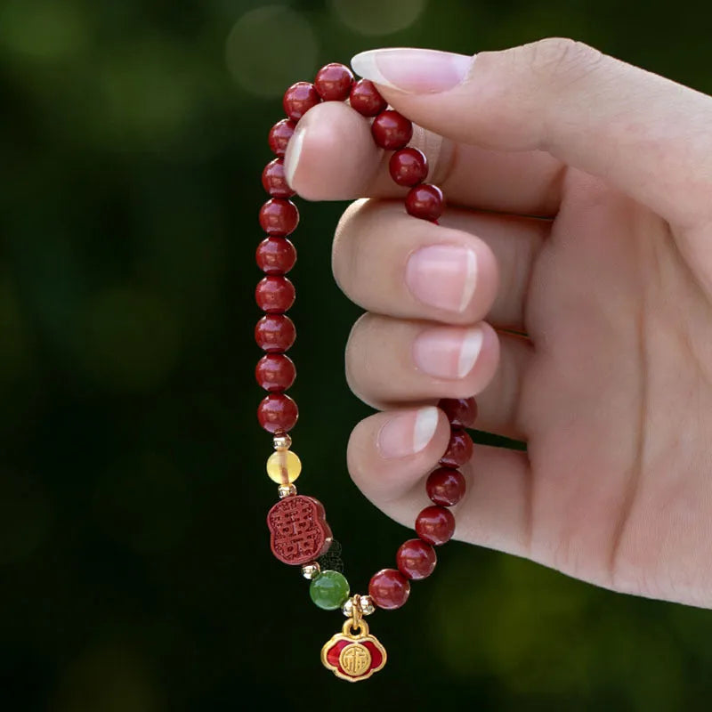 Emperor sandstone bracelet with cinnabar fu character in New Chinese style, shown in 6mm and 8mm bead sizes.