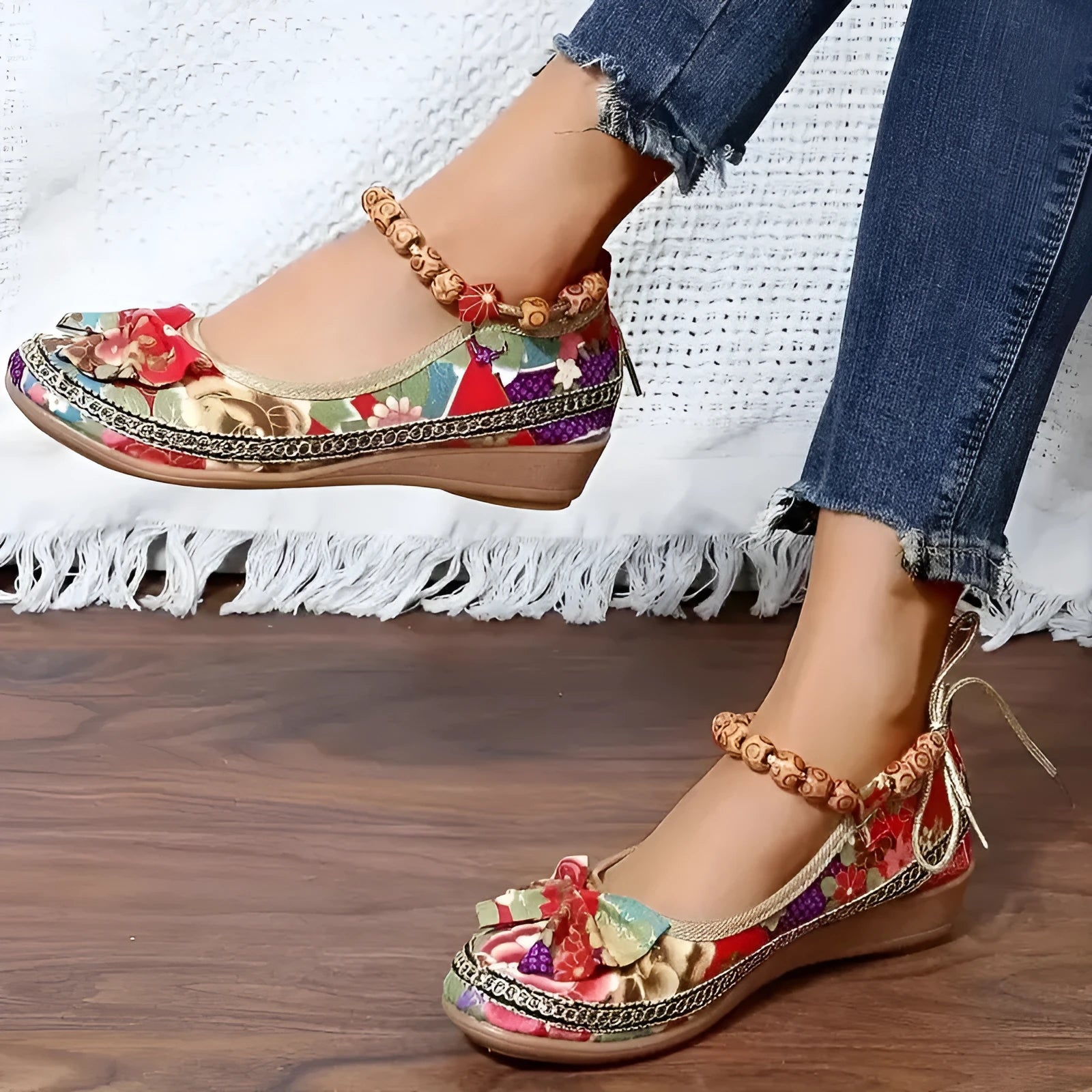 Women's black plus size ethnic platform sandals with cloth upper and elastic band.