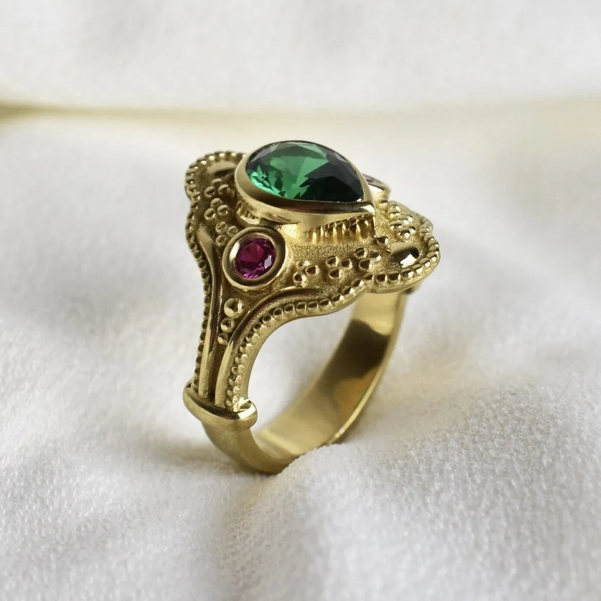 Geometric gold-plated alloy ring for women on a plain background, showing its ins style design.