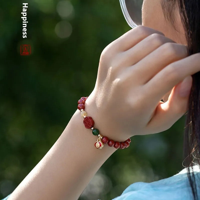 Emperor sandstone bracelet with cinnabar fu character in New Chinese style, shown in 6mm and 8mm bead sizes.