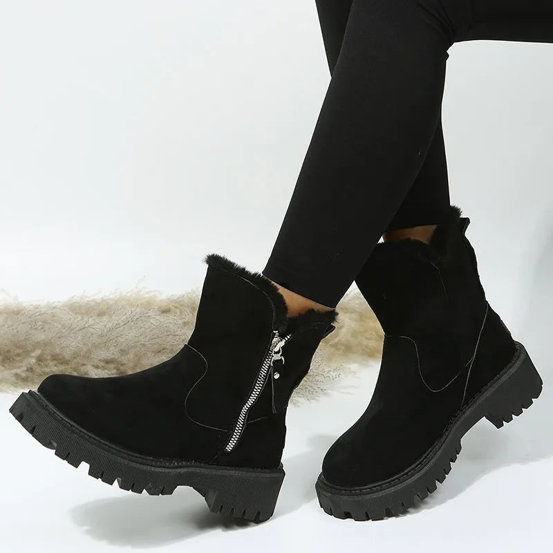 Women's black thick plush high-top snow boot with side zip and non-slip rubber sole.