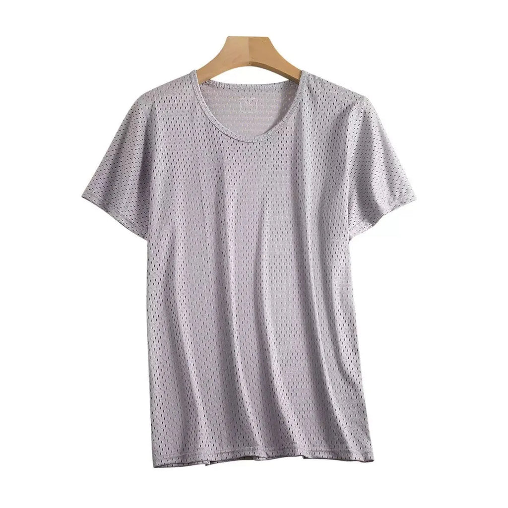 Man wearing a solid colour ice silk short sleeve t-shirt with a loose crew neck fit