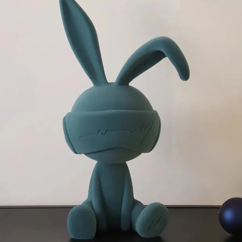 Resin suede blindfold rabbit table ornament in blue, green, and red colour options