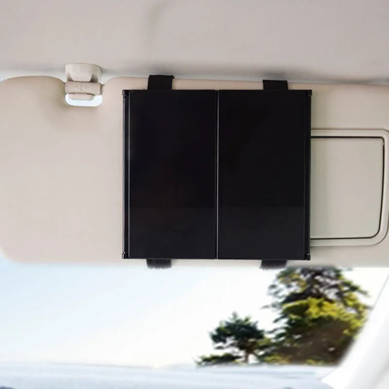 Silver car visor folding makeup mirror showing opened and closed positions