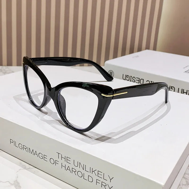 Women's large frame cat's eye reading glasses with dragon and phoenix decorations on the temples.