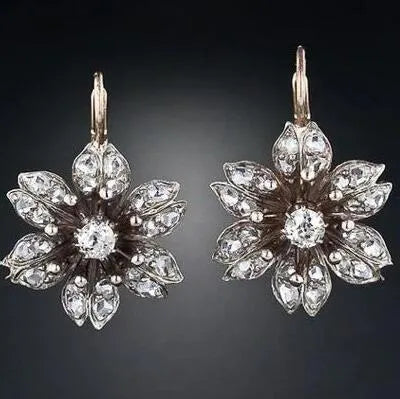 Silver retro fashion creative female earrings with alloy electroplated construction