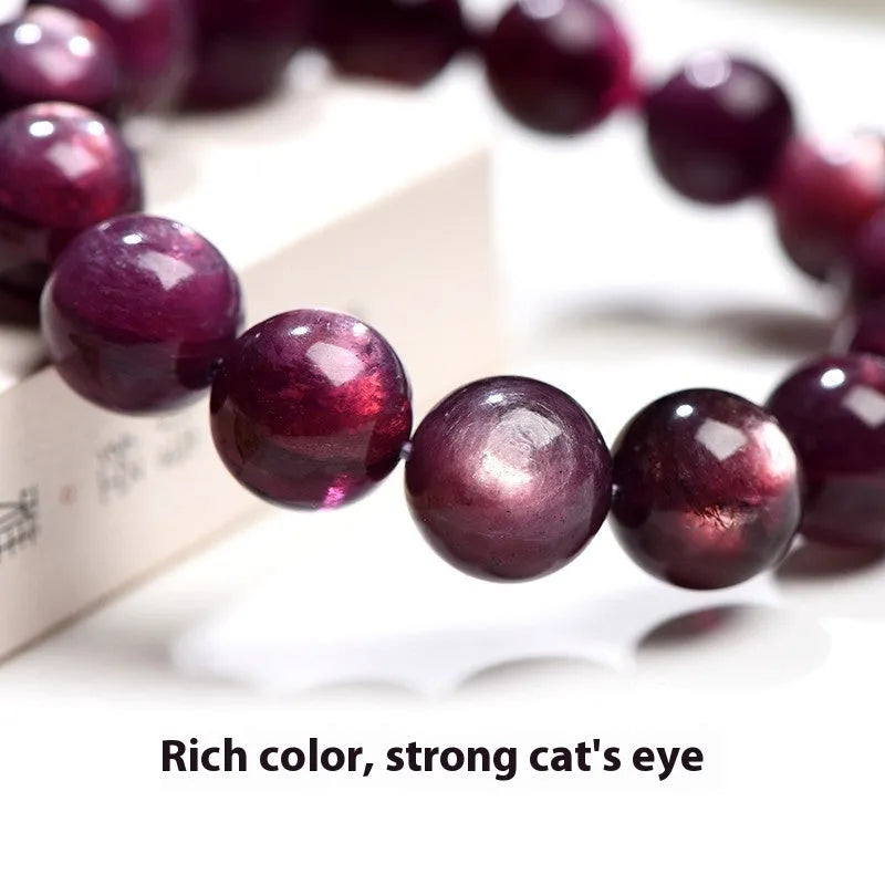 Purple lepidolite crystal bracelet with round polished beads showing multiple size options