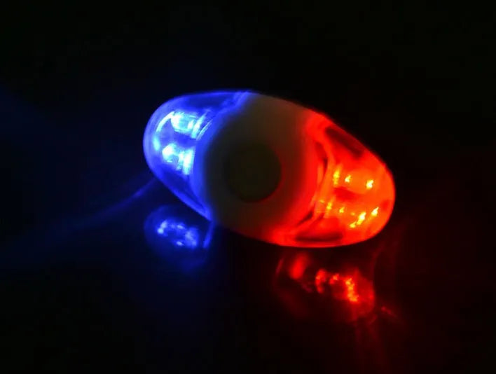 Red and blue dual-colour bicycle tail light with four LED beads on an adjustable mounting bracket.