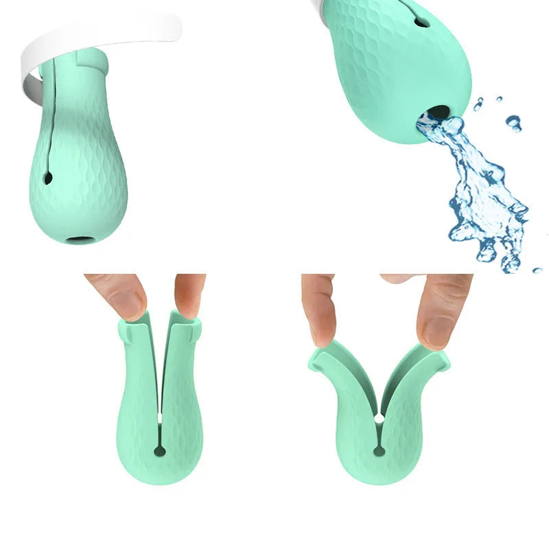 Set of four green silicone cat paw covers designed as anti-scratch gloves for pet washing and medication