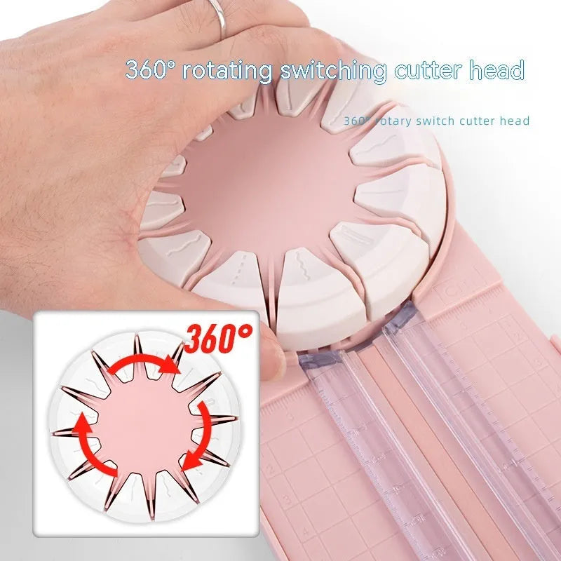 Pink plastic paper cutting machine with 12 pattern functions measuring 46.2 cm long