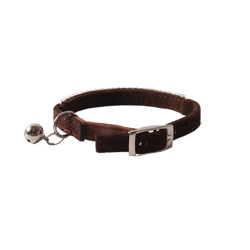 Flannel elastic buckle cat collar with gang drill decoration in assorted colours on a white background.