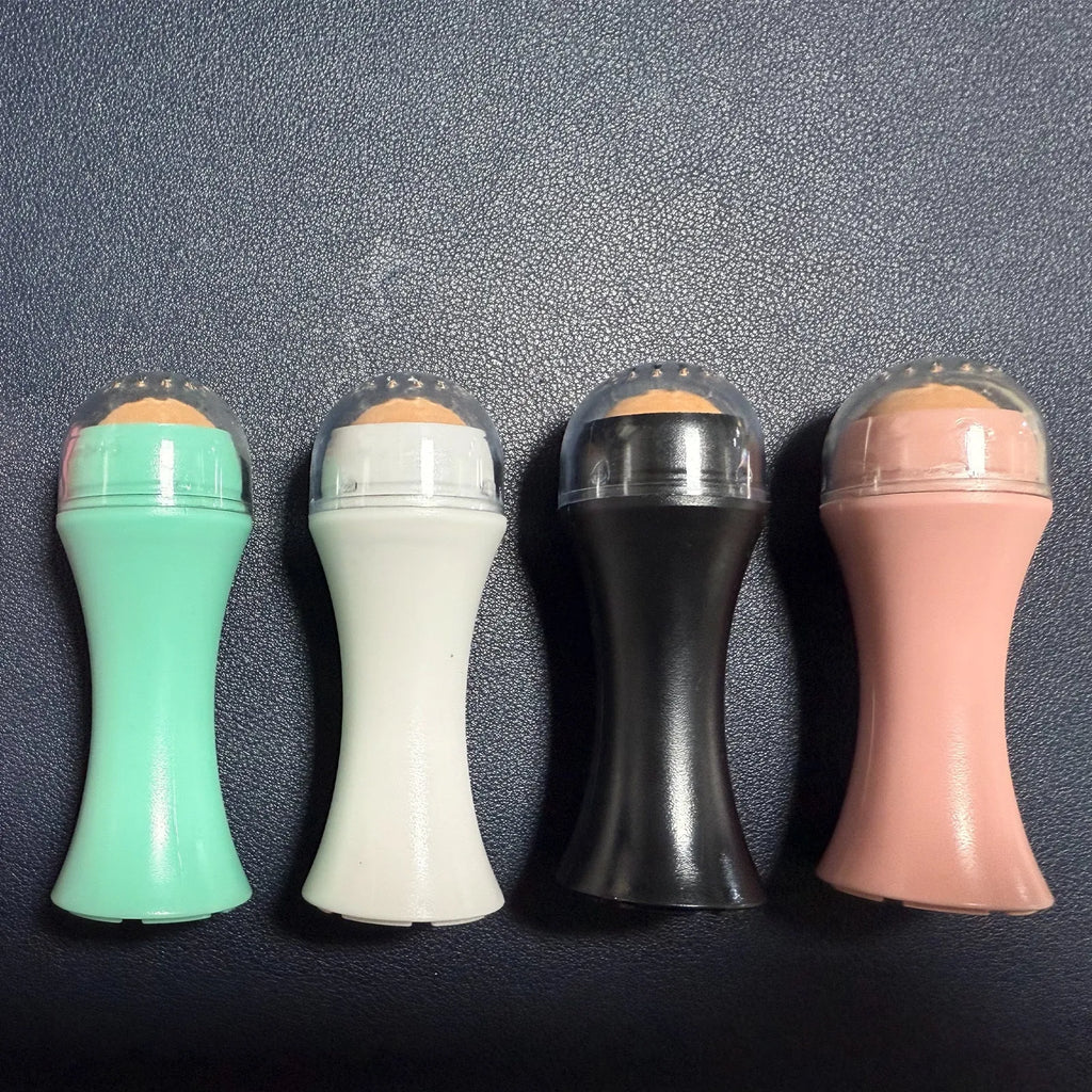 Portable volcanic stone oil control roller in black, green, pink or white for facial skincare