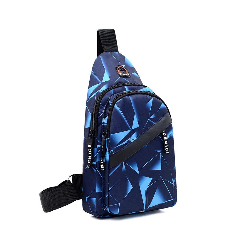 Men's blue Oxford cloth crossbody sling bag with an earphone hole and zipper, shown in a square vertical shape.