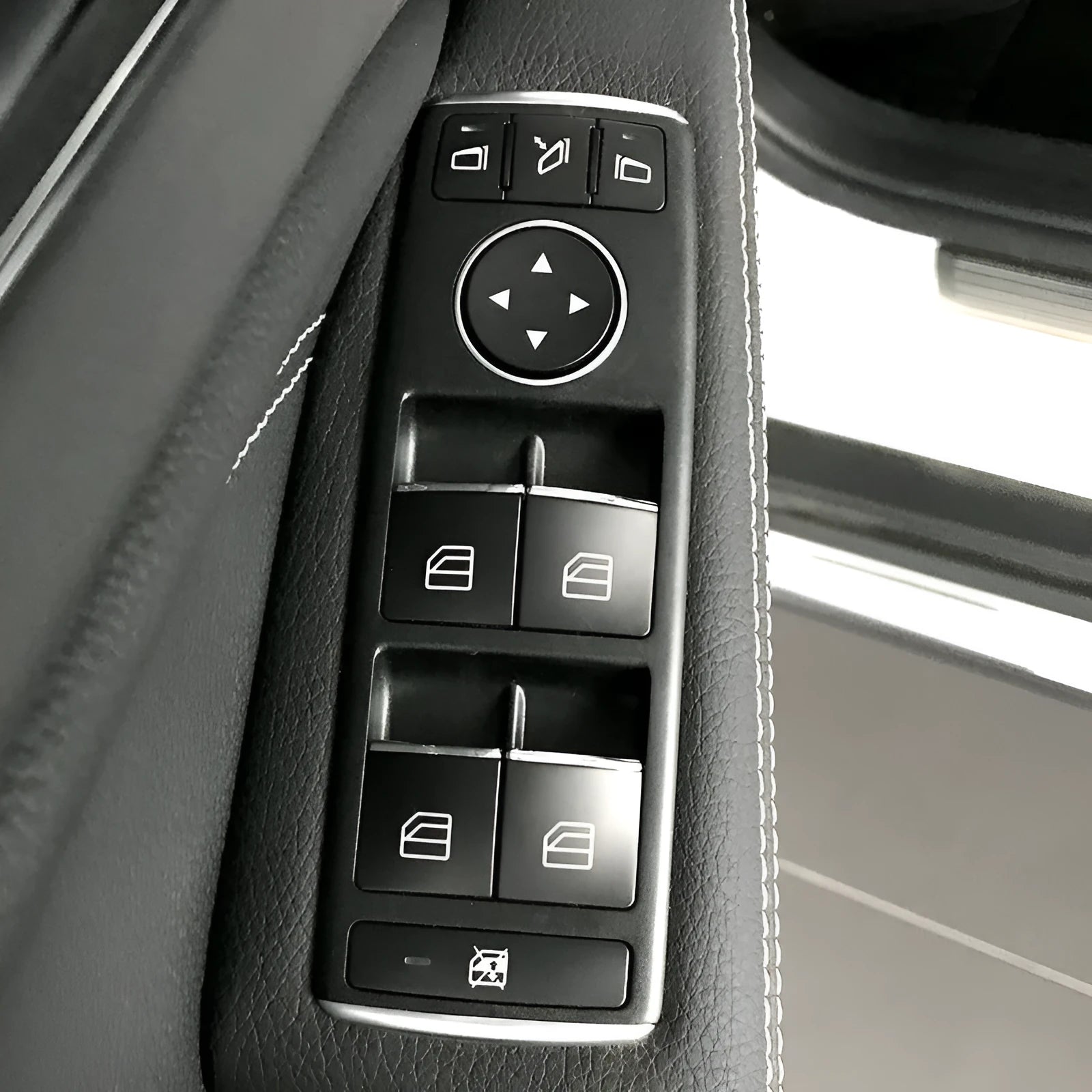 Black glitter decorative sticker for car window lift button on ABS plastic backing.