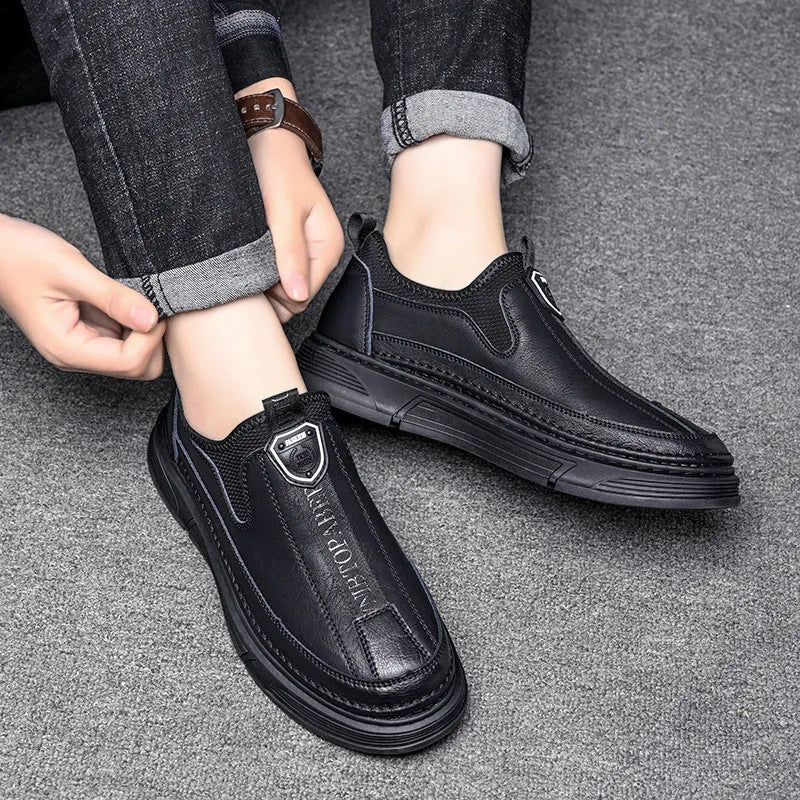 Men's solid colour casual leather shoes with round toe design in black and brown options