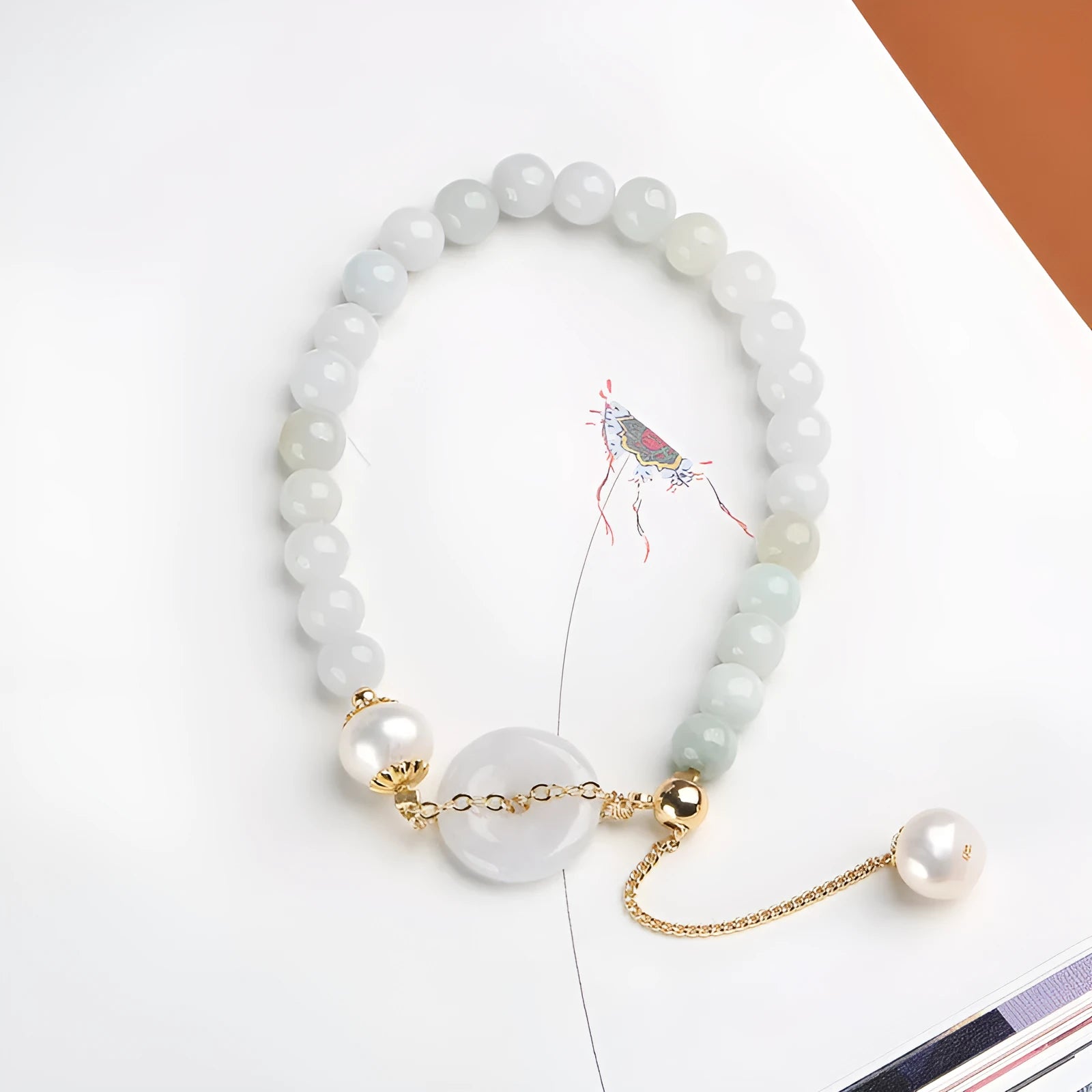 Women's natural emerald jade pearl bracelet with geometric design and traditional Chinese styling
