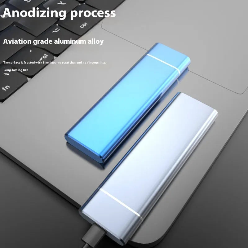 Sapphire blue portable external solid state hard drive with metal shell, shown next to its USB cable.