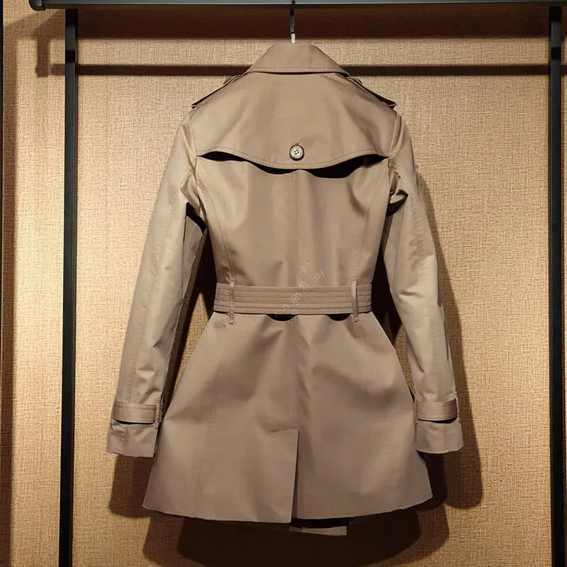Khaki women's double-breasted polyester trench coat with flight sleeves.