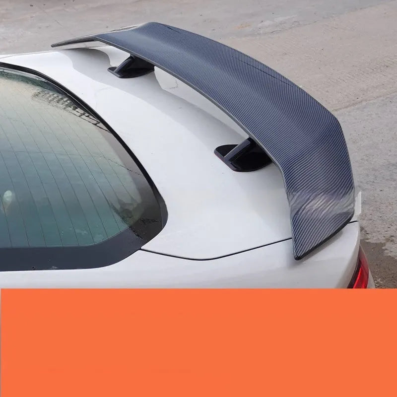 Universal punch-free car spoiler in ABS plastic for exterior modification, shown in available finishes.