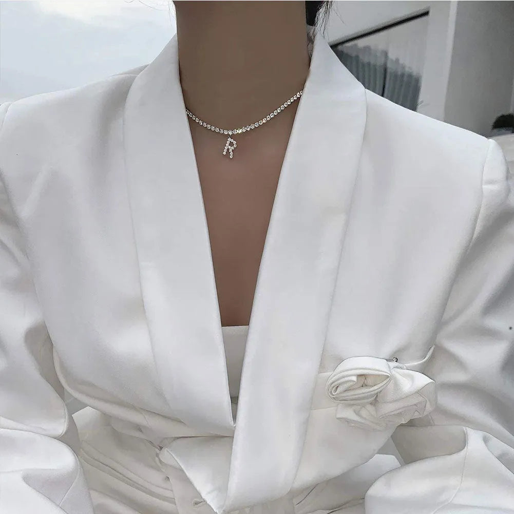 Personalised diamond letter necklace with rhinestone pendant on claw chain in gold finish