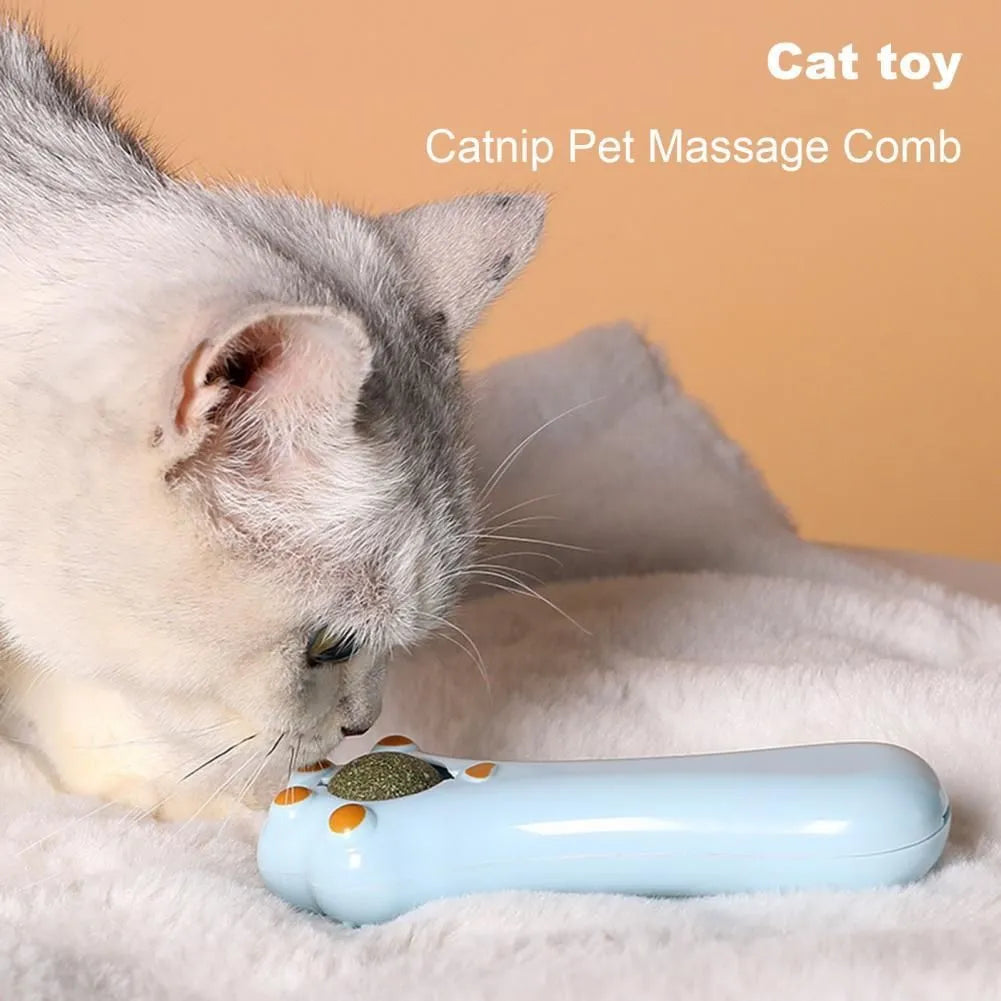 Blue cartoon-design cat grooming comb and dental toy with catnip cartridge measuring 13.5cm long