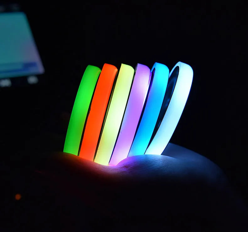 68mm LED cup holder coaster with 7-colour RGB lighting for cars, showing non-slip acrylic surface and USB charging port
