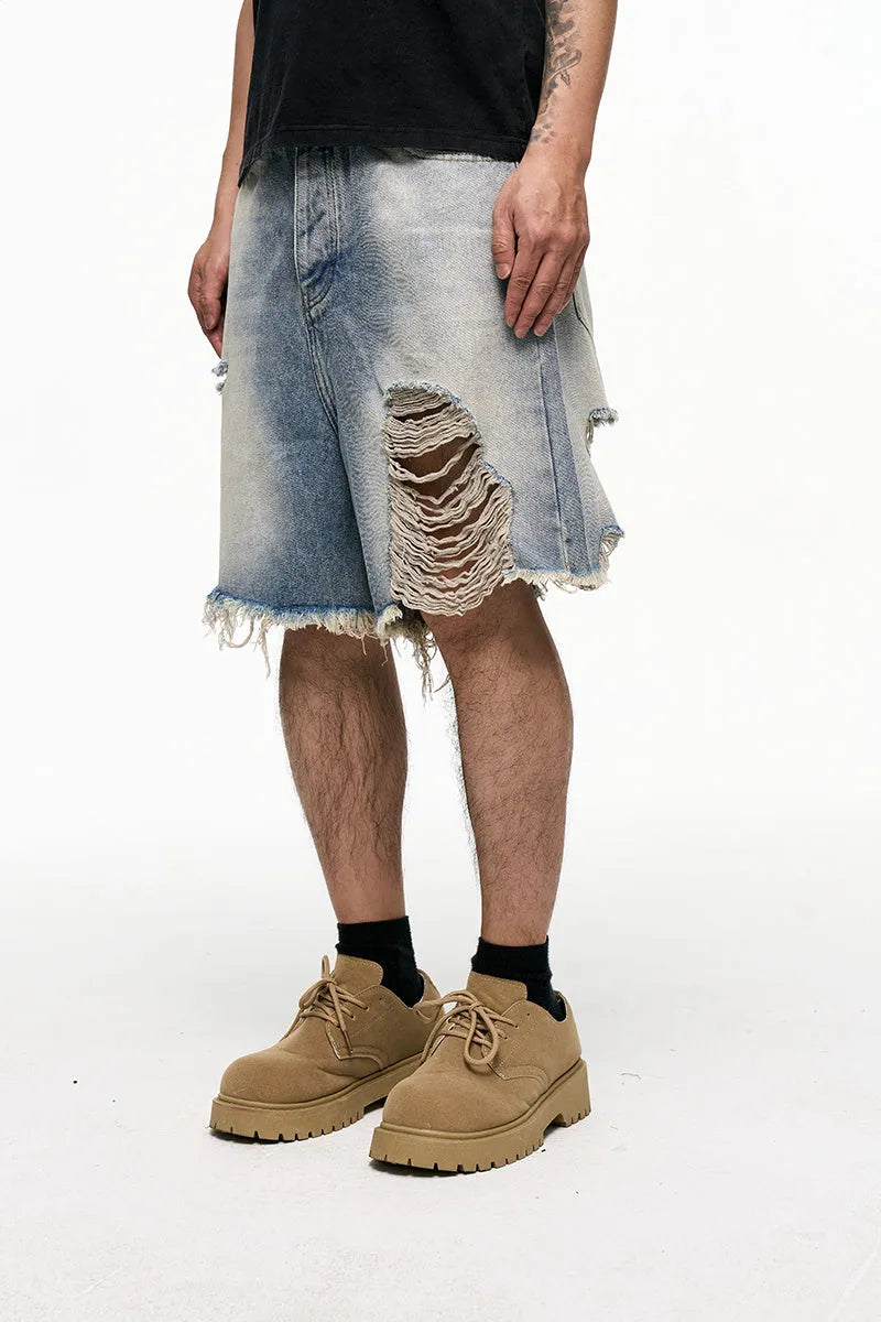 Light blue retro washed men's baggy denim shorts with wide leg cut and fifth pants length
