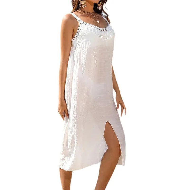 White women's suspender beach dress with hollow crochet weaving and bottom slit