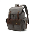 Retro wear-resistant canvas backpack in army green with antique bronze hardware, 16-inch laptop capacity