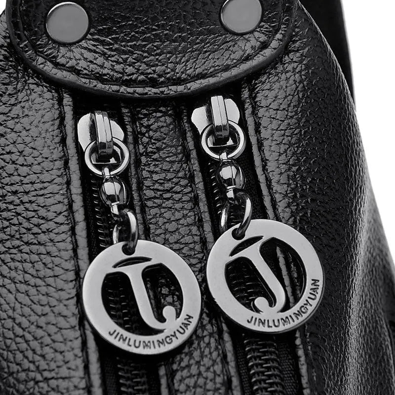 Blue women's large shoulder bag with crossbody strap showing internal mobile phone and certificate pockets