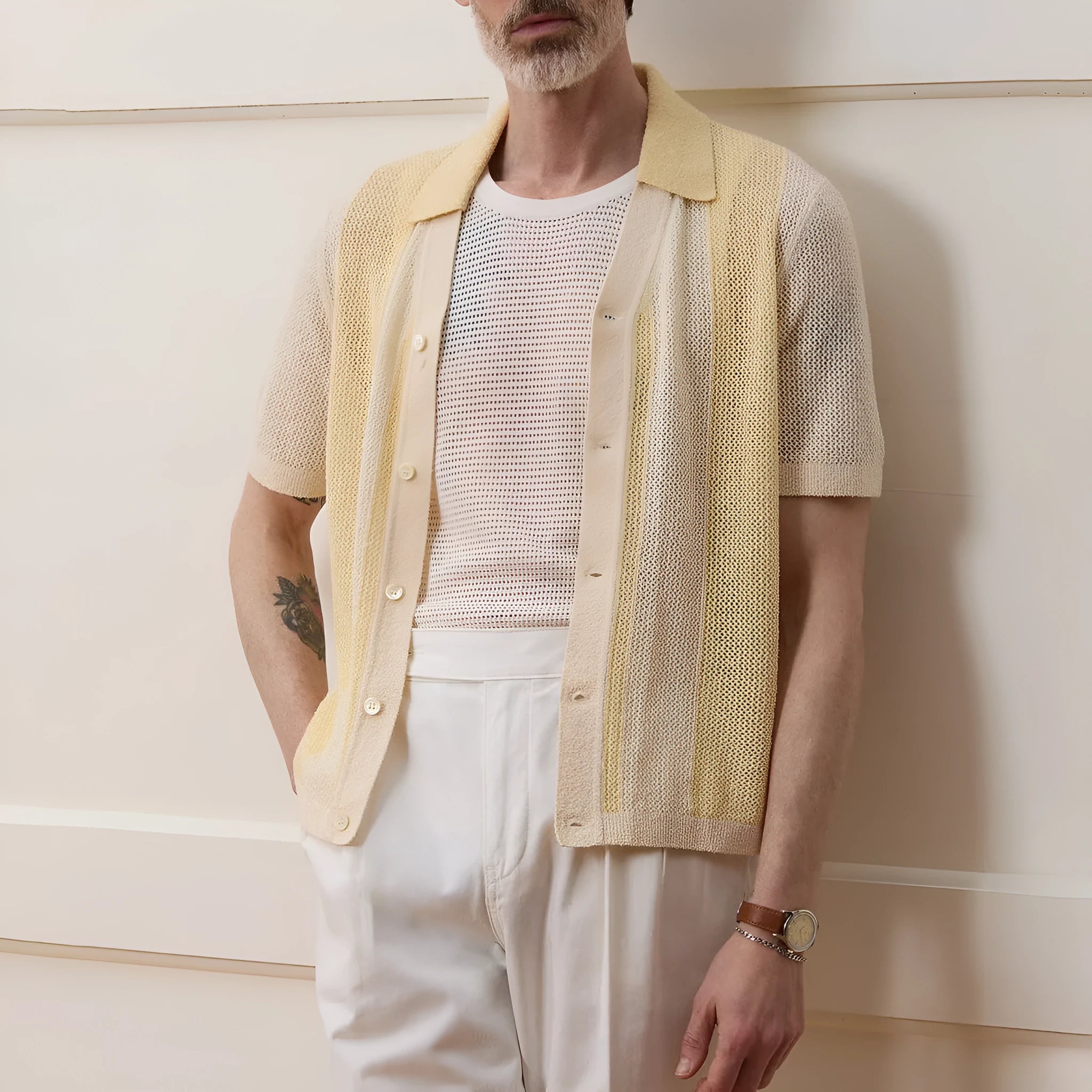 Hollow-out short-sleeved Tencel polo shirt in yellow with asymmetric design