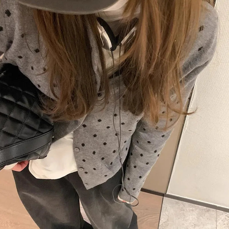 Women's grey dot pattern knitted cardigan with crocheted flower sleeves in loose fit free size