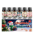 Christmas aromatherapy oil gift set showing six 60ml bottles of scented oil for home fragrance.