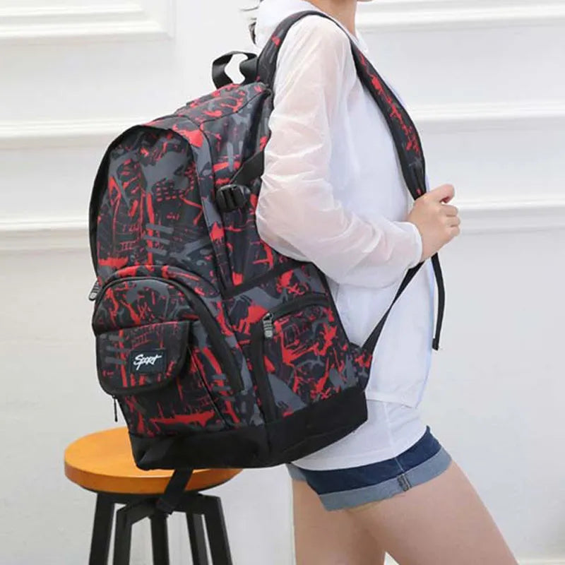A blue classic nylon backpack with large capacity, showing padded straps and a front pocket.