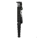 Black carbon fibre telescoping camera monopod extended to its full height.