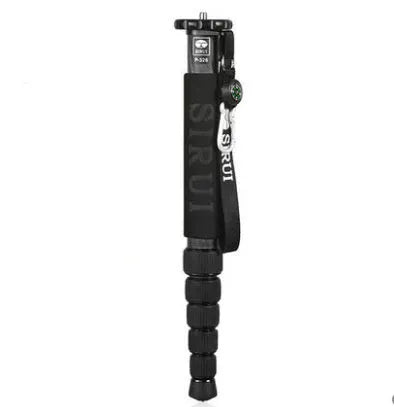 Black carbon fibre telescoping camera monopod extended to its full height.