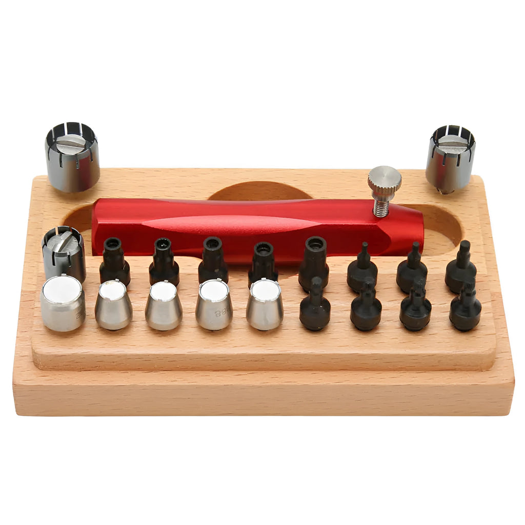 Open case showing steel watch repair tools including barrel opener, punch pliers, and 20 screwdriver bits.