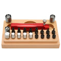 Open case showing steel watch repair tools including barrel opener, punch pliers, and 20 screwdriver bits.