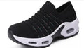 Plus size fly-knit sock shoes in 2088 Tao black with round toe, low heel, and stretch mesh upper