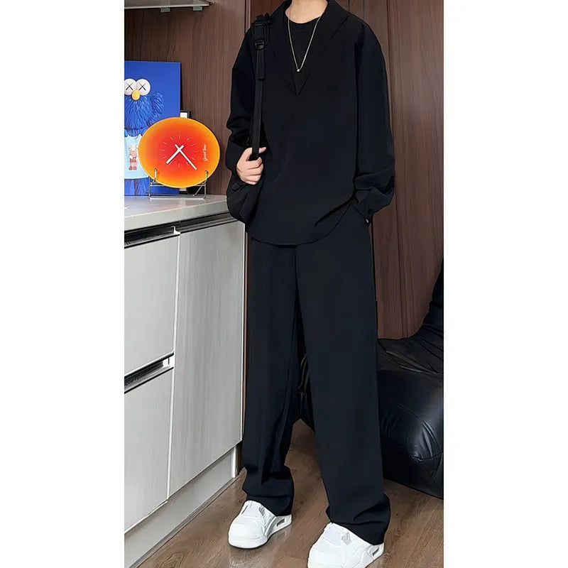 Men's black casual two-piece set with long sleeve polo shirt and matching trousers