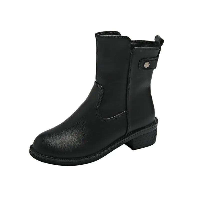 Black women's short boots with a side zip, round toe, and low rubber heel on a neutral background.