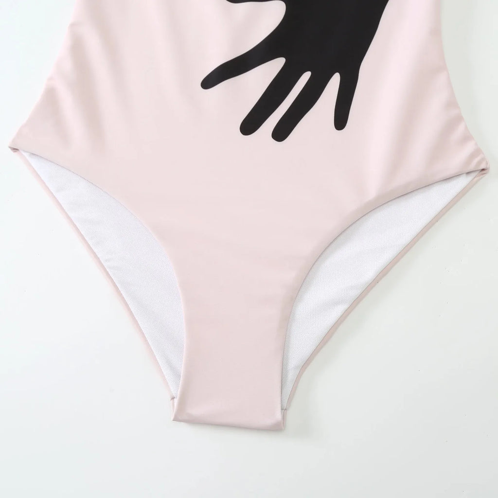 Women's polyester bikini swimsuit with attached tulle skirt in two-piece design